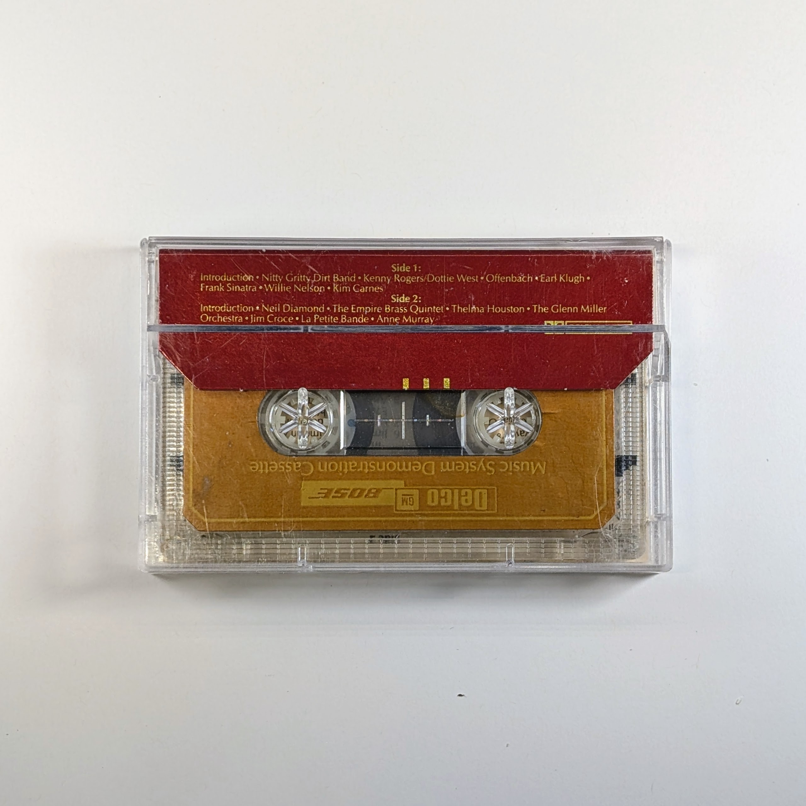 Music System Demonstration Cassette Delco/GM/Bose/Chevrolet - Red